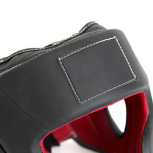 Durable boxing headgear with adjustable fit and breathable lining.