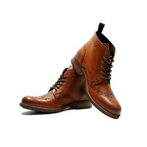 Pair of leather shoes stylish brown leather brogue boots with intricate detailing, classic lace-up design, and durable sole